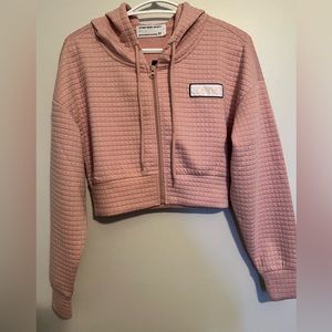 Brand new. Didn’t know it was a crop top. Urban Planet.